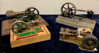 Five small horizontal steam engines, bronze base, brass flywheel on wood base, 2 1/4" flywheel, lg. 6", wd. 3 1/4", ht. 4"; horizontal steam engine, 