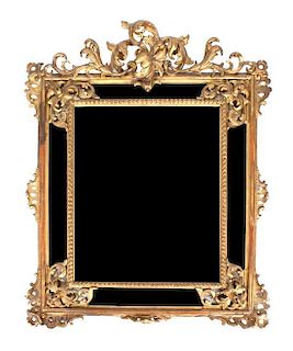 A Louis XV Style Giltwood Mirror, Height 54 x width 41 inches.