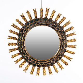 Espejo. Siglo XX. Diseño solar. Con luna circular, teselas de espejo.