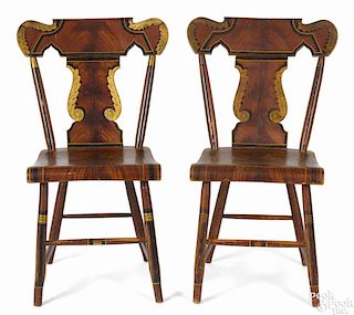 Pair of Pennsylvania painted plank seat dining chairs, mid 19th c., probably York