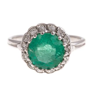 A Vintage Emerald and Diamond Ring on Platinum
