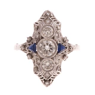 A Filigree Diamond & Sapphire Ring in Platinum