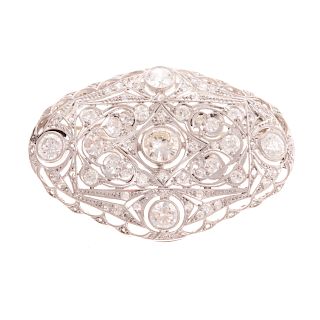 An Art Deco Diamond Filigree Brooch in Platinum