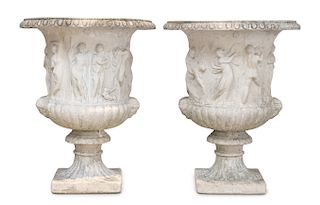 A Pair of Neoclassical Stone Urns Height 27 1/2 inches.
