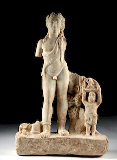Roman Marble Relief with Dionysus, Silenus, & Child