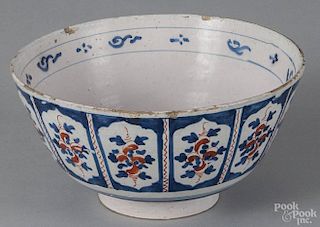English Delft tin glazed earthenware bowl, mid 18th c., with red and blue floral decoration