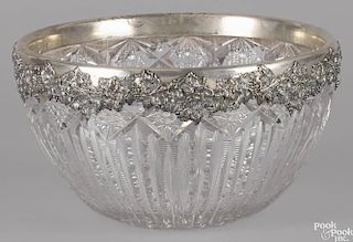 Brilliant cut glass centerpiece punch bowl, early 20th c., with a sterling silver grapevine