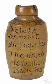 Whimsical English stoneware beer bottle, 19th c., impressed Elliot London
