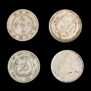 SET OF FOUR CHINESE SILVER COINS