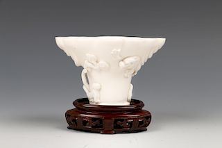 CHINESE BLANC-DE-CHINE LIBATION CUP WITH STAND