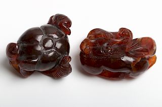 PAIR OF CHINESE RED AGATE CARVINGS, QING