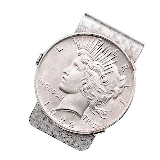 Clip para billetes en metal base. Moneda plata liberty. Peso: 46.5g.