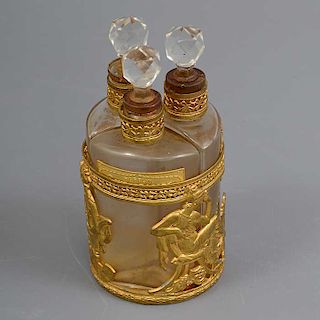 3 perfumeros. Francia. Siglo XX. Elaborados en cristal. Con aplicaciones de metal dorado. Decorados con elementos grecolatinos.