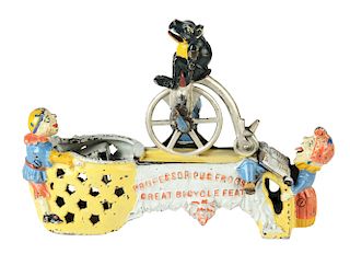 J. & E. Stevens Professor Pug Frog's Great Bicycle Feat Cast Iron Mechanical Bank.