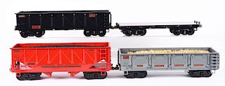Lot Of 4: Contemporary Pressed Steel T Reproductions Outdoor Railway Freight Cars.