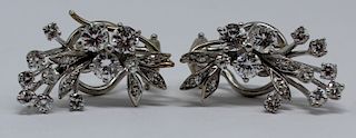 JEWELRY. Pair of 14kt Gold and Diamond Earrings.