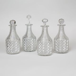 Set of Four Cut Glass Decanters and Four Stoppers