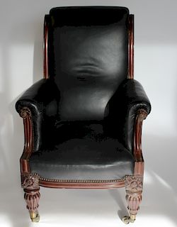 Antique Leather Upholstered High back Arm Chair.