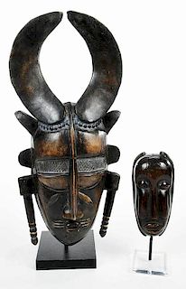 Two Carved Wood African Masks Mounted