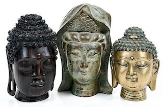 Three Bronze and Hardwood Deity Heads