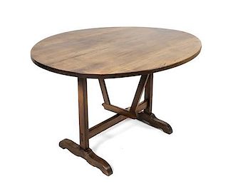 A French Fruitwood Wine Tasting Table, Height 29 x width 47 1/2 x depth 40 1/2 inches.