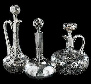 Three Silver Overlay Decanters
