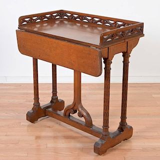 Gothic Revival carved oak writing table