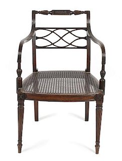 A Regency Style Mahogany Open Arm Chair, Height 32 1/2 x width 21 x depth 19 1/2 inches.