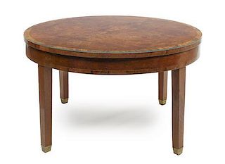 An American Circular Mahogany Low Table, Height 20 1/4 x diameter 36 inches.