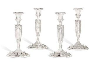Four Gorham weighted sterling candlesticks