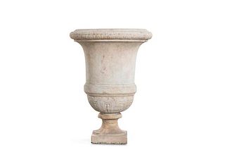 A Continental Neoclassical carved marble campana form urn