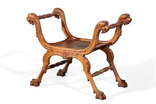 A Continental Baroque style walnut curule stool