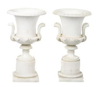 A Pair of Marble Urns, Height 14 1/4 inches.