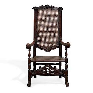 A William and Mary carved walnut armchair