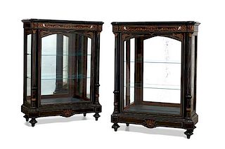 A pair of Napoleon III ebonized display cabinets