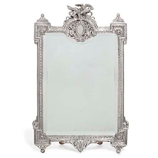 A sterling silver Neoclassical style mirror