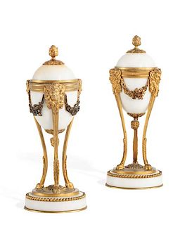 A pair of Louis XVI style marble cassoulettes