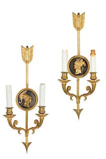 A pair of Empire bronze twin branch wall lights
