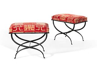 A pair of Pompeiian style wrought iron stools