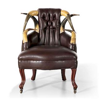 A tufted leather and horn child's armchair