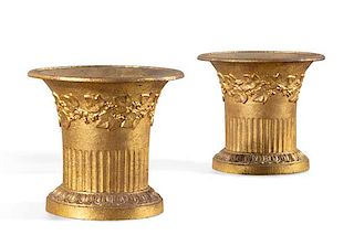 A pair of Neoclassical style gilt iron cache pots