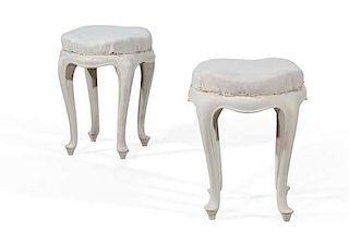 A pair of Italian Rococo style painted stools