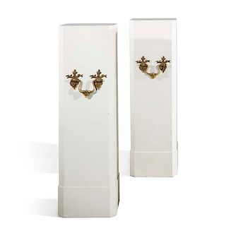 A pair of bronze mounted white painted pedestals