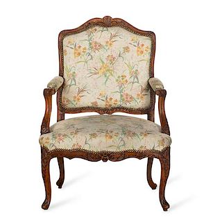 A Louis XV carved walnut fauteuil , 18th century