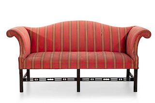 A George III style upholstered mahogany sofa