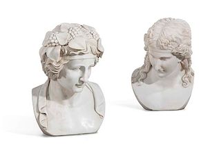 A pair of Classical style carved marble busts