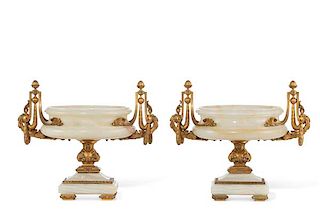 A pair of Napoleon III gilt bronze and onyx bowls
