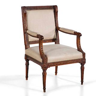 A Louis XVI carved walnut fauteuil, 18th century