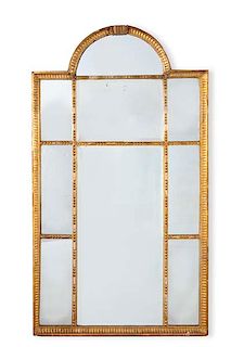 A Continental Neoclassical style giltwood mirror