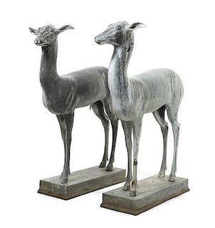 A Pair of Cast Metal Garden Figures, Height 38 inches.